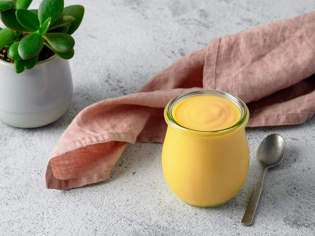 Related image yellow mango lassi gray background indian mango yogurt drink with copy space left