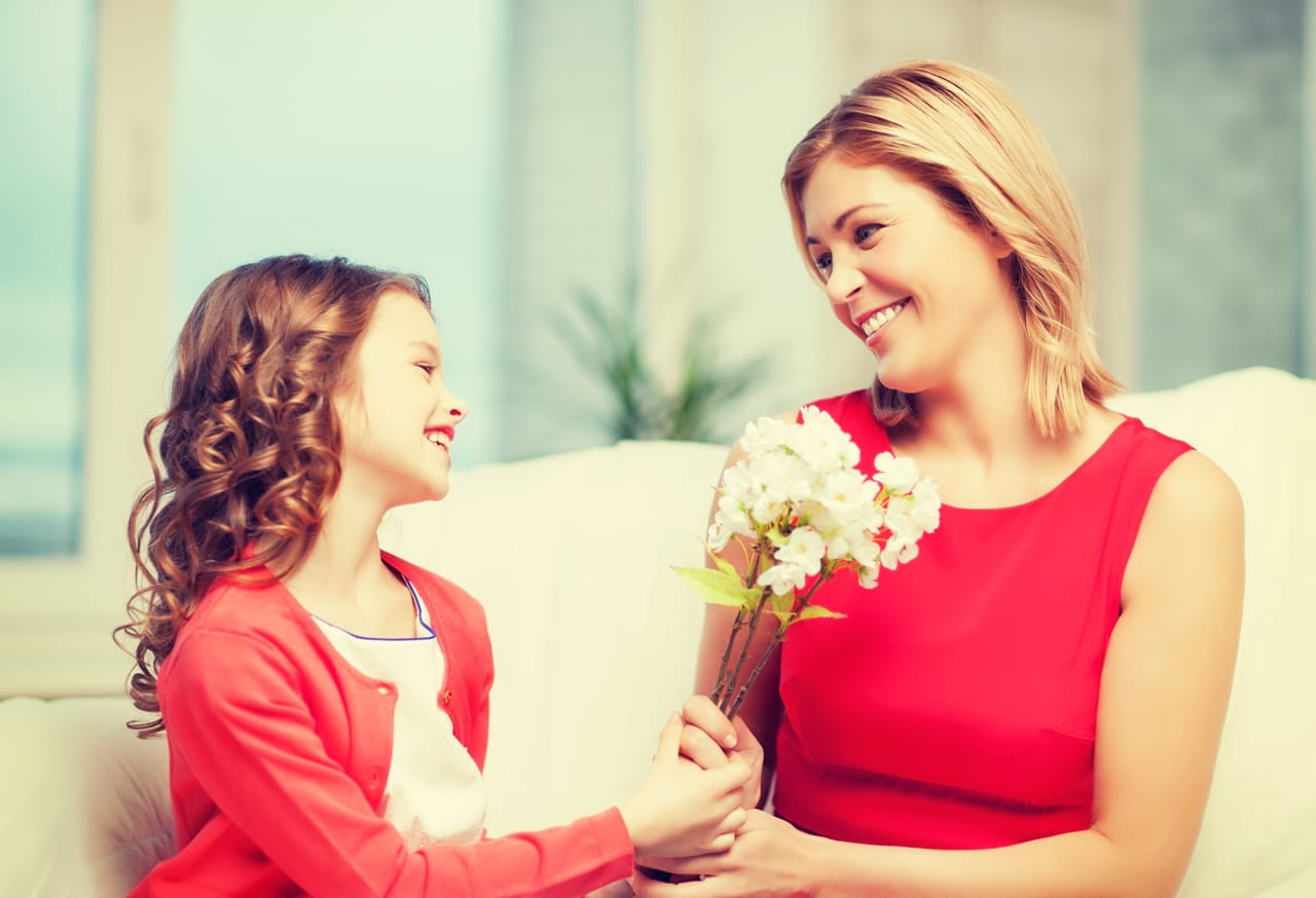 Related image joyful mother and her little cute daughter with flowers